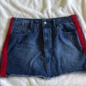 Jean skirt with red detailing along sides